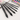 Fuumuui 6pcs professional squirrel hair mop watercolor brushes in various sizes, with a watercolor paint palette visible.
