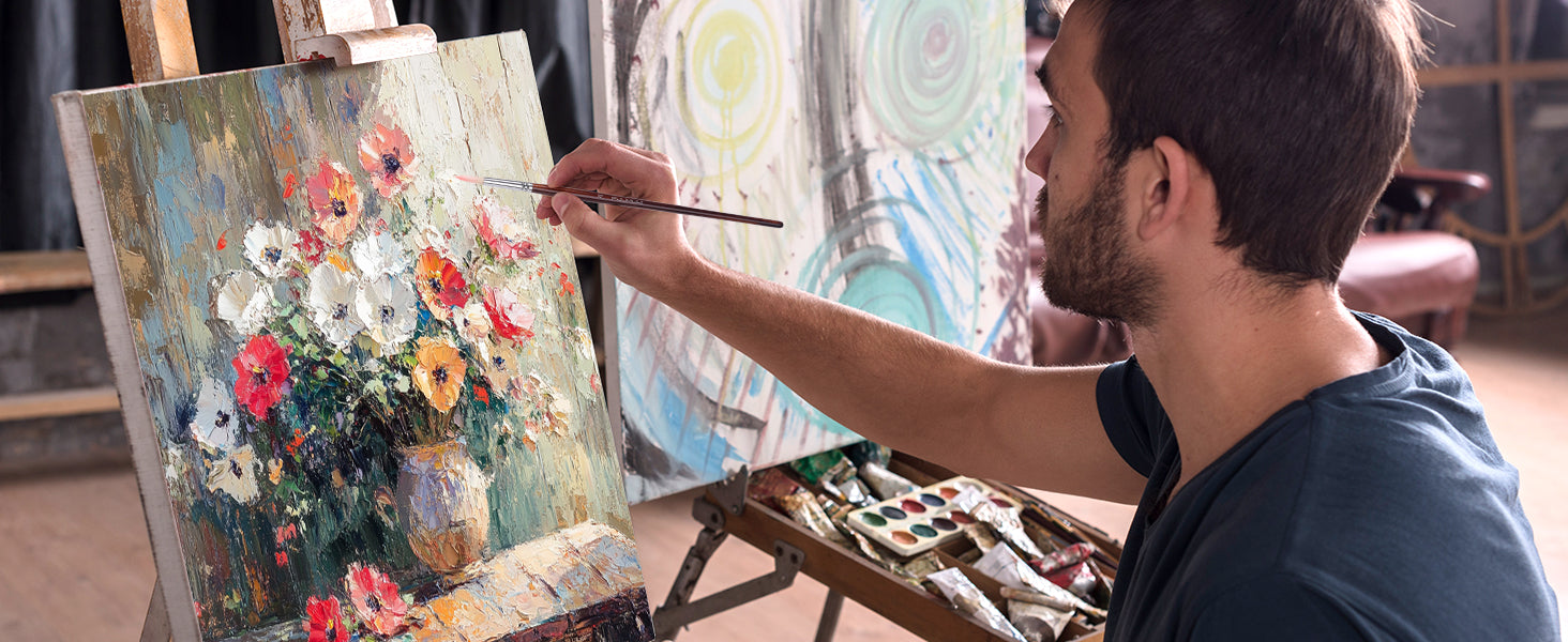 Professional artist using a natural bristle oil paint brush from an 11pcs set to create a textured floral painting. High-quality hog bristle brush perfect for professional oil paint and acrylic paint techniques.