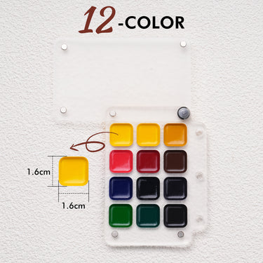 Compact 12-color Travel Palette for watercolor paint set. Clear acrylic portable palette featuring 1.6cm x 1.6cm square pans with vibrant pigment, ideal for professional artists and beginners on the go.