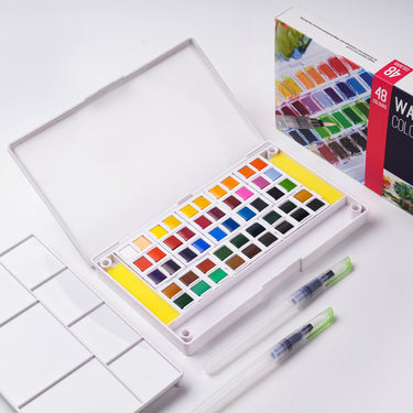 Fuumuui 48 Color Watercolor Paint Set with vibrant paint pans in an open case, two water brushes, and a white mixing palette.