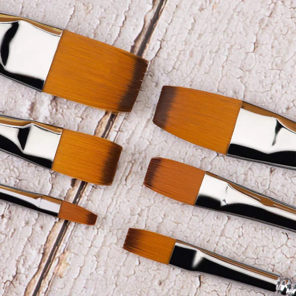 A close-up of Fuumuui flat artist paint brushes in a range of sizes, featuring high-quality nylon hair bristles.