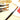 Fuumuui Ensemble de 9 pinceaux professionnels en nylon pour peinture acrylique avec pointes rondes, présentés avec de la peinture rouge sur une palette.