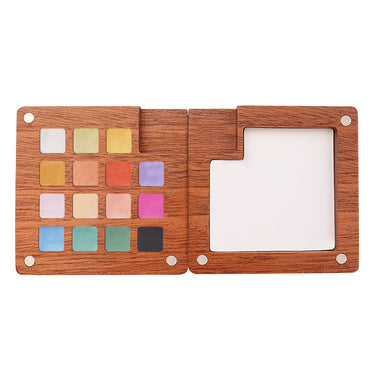 Fuumuui Pearlescent Watercolors: Open magnetic wooden palette displaying 15 iridescent square watercolor pans.