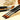 Fuumuui Ensemble de 9 pinceaux professionnels en nylon pour peinture acrylique avec pointes rondes, manches noirs et poils orange.
