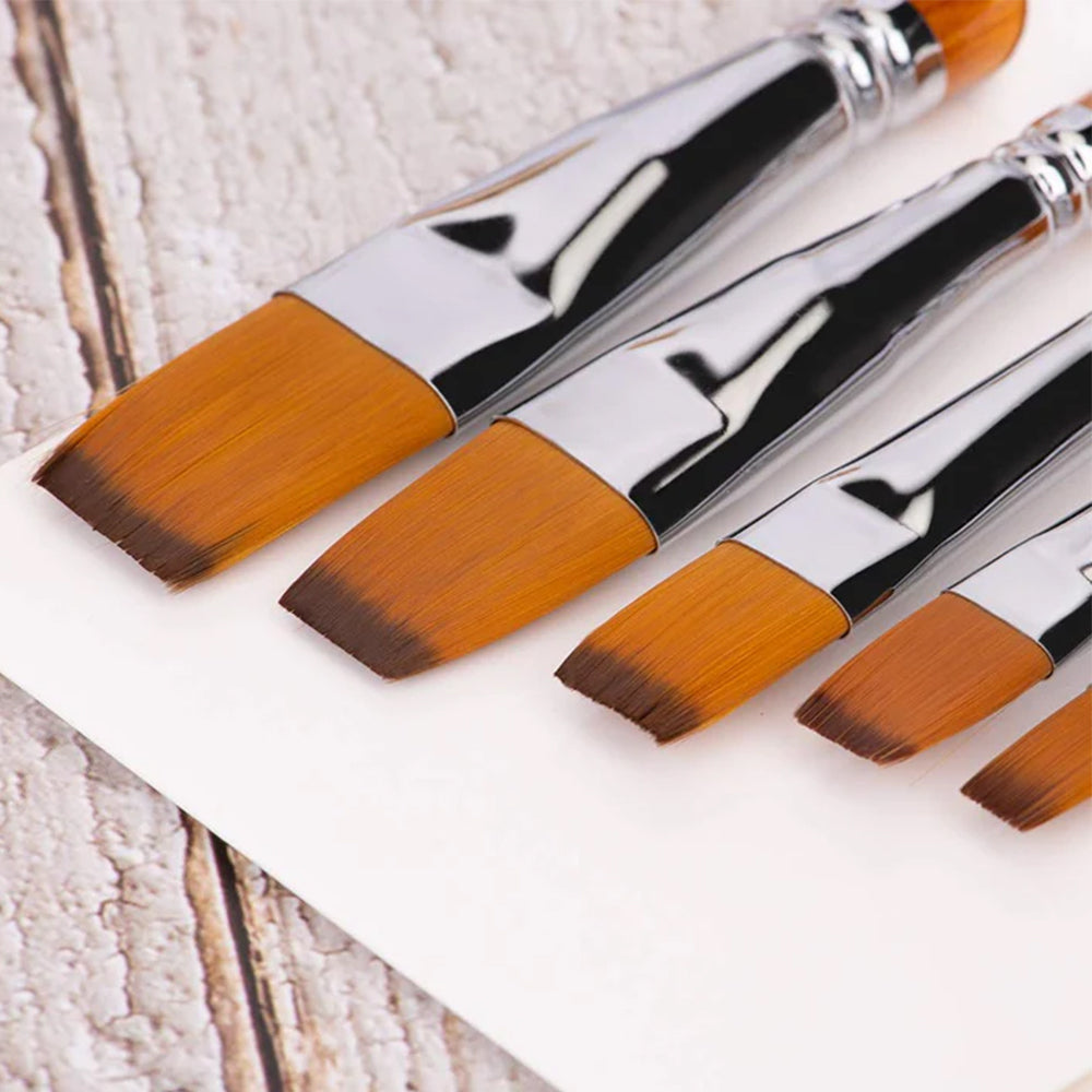Fuumuui professional flat acrylic brushes with durable Japanese nylon hair on a wooden background.