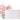 Fuumuui Keramik-Tablett-Palette, ein elegantes weißes rechteckiges Keramik-Mischtablett, ausgestellt vor einem lebendigen rosa Aquarell-Blumengemälde.