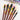Fuumuui 6pcs professional watercolor brushes in sizes 2, 4, 6, 8, 10, 12, with dark wood handles and black pointed tips, displayed on a vibrant watercolor painting.