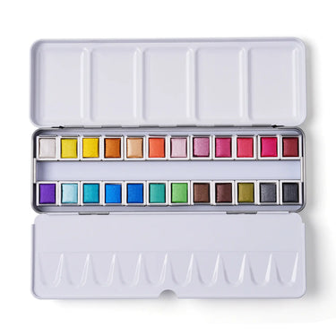 Displaying the FUUMUUI 24-color half-pan metallic solid watercolor paint set.