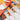 Fuumuui natural bristle oil paint brushes in sizes 80, 60, 50, and 40. Large flat brushes for professional artists and beginners, displayed with abstract oil paintings and tubes of lemon yellow and scarlet oil paint.