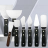Set de 8 spatules à palette Fuumuui Art Supplies en acier inoxydable, présentant diverses spatules à peindre et spatules à peinture avec des manches noirs et un manche en bois pour les peintures à l'huile et à l'acrylique.