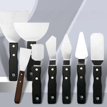 Set de 8 spatules à palette Fuumuui Art Supplies en acier inoxydable, présentant diverses spatules à peindre et spatules à peinture avec des manches noirs et un manche en bois pour les peintures à l'huile et à l'acrylique.