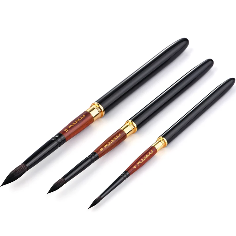 A set of three Fuumuui professional squirrel hair travel brushes, with caps extended to create full-size watercolor painting brushes.