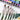Fuumuui 6pcs professional watercolor brushes with natural hair bristles and white handles, displayed alongside a colorful pan watercolor paint set.
