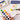 Fuumuui Portable 12-color solid watercolor paint set open, featuring colorful solid paints, an included paintbrush, and the lid used as a mixing palette for Fuumuui art supplies.