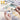 Fuumuui 24-Color Opaque Semi-Solid Watercolor Paint Set, featuring muted, curated colors. A hand expertly paints a cat illustration, showcasing these versatile Fuumuui art supplies for various artistic styles.