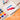 Fuumuui Ceramic Watercolor Palette, a low-glare porcelain paint mixing tray, with a brush blending red and blue watercolors for artists.