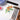 Fuumuui professional calligraphy brushes for watercolor & ink painting, displayed with a floral artwork, brush rest, and traditional art supplies.
