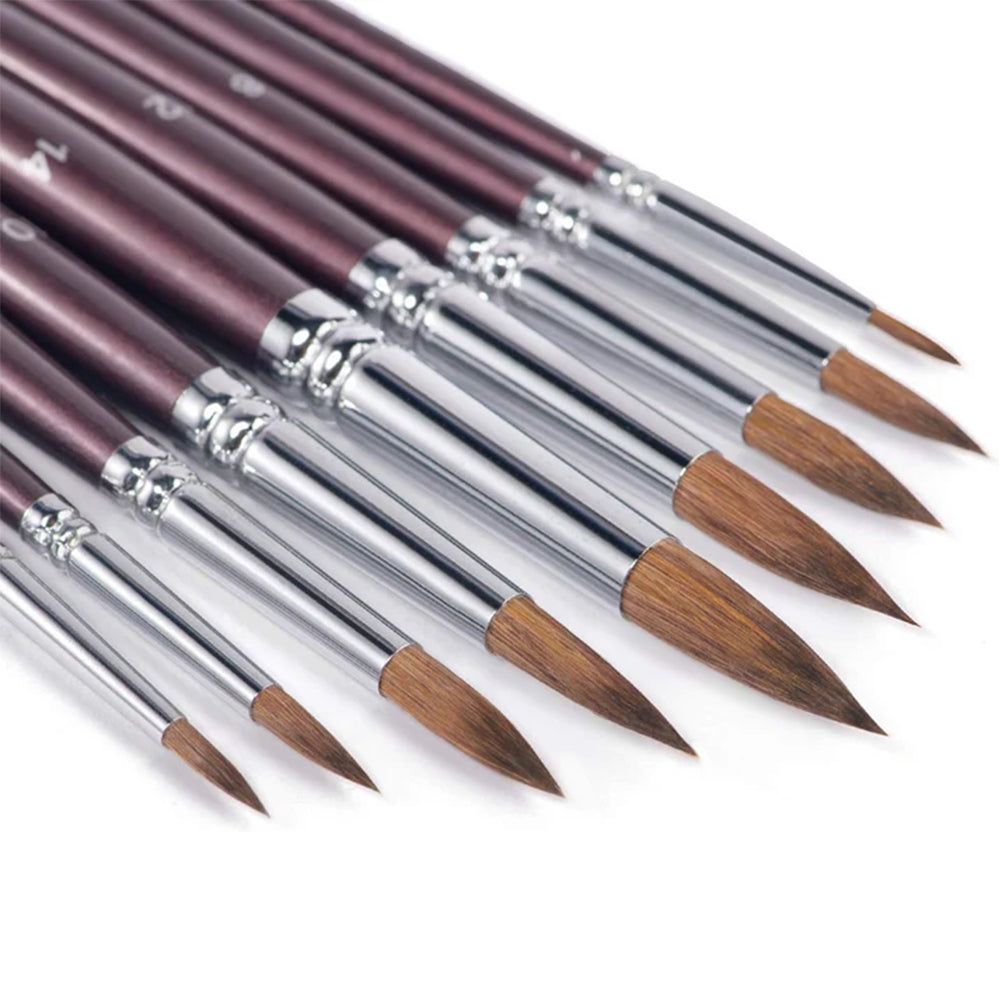 An angled shot of the Fuumuui sable watercolor brushes, emphasizing the pointed tips of each round brush.