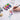 Fuumuui 9-color watercolor powder set and brush creating a vibrant jellyfish illustration on paper. These Fuumuui art supplies offer high water solubility, perfect for detailed illustration and creative journaling.