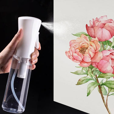 Fuumuui High-Pressure Spray Bottle held in hand, powerfully spraying a fine, continuous mist.