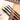 Fuumuui 4pcs professional nylon hair watercolor brushes (sizes 4, 8, 12) on a floral painting with watercolor palette.