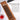 Fuumuui professional calligraphy and watercolor brushes featuring polished wooden handles, natural white bristles, and functional hanging cords, ideal for ink painting, displayed on a bamboo mat with red ink.