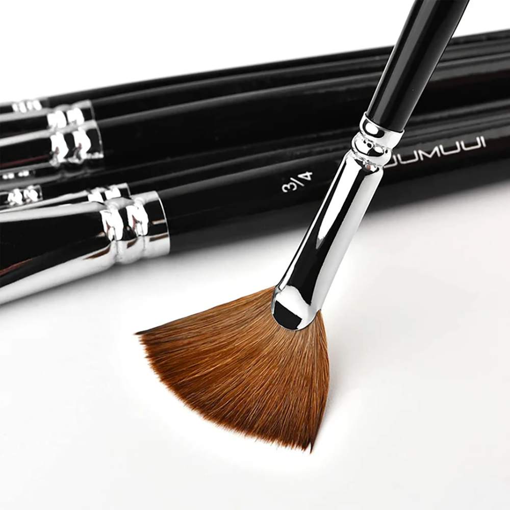 A fan-shaped sable watercolor brush, its unique bristle shape and quality.