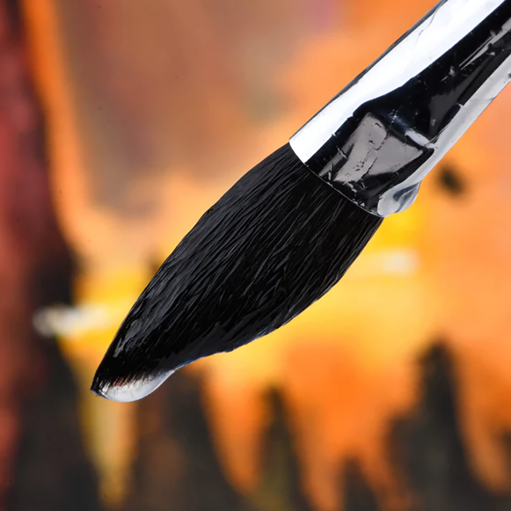 A squirrel hair watercolor brush, with a water droplet on its tip, excellent liquid-holding ability.