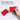 Fuumuui red plastic portable watercolor paint palette box with lid, ideal for painting on the go with its ultra-compact, pocket-sized design.