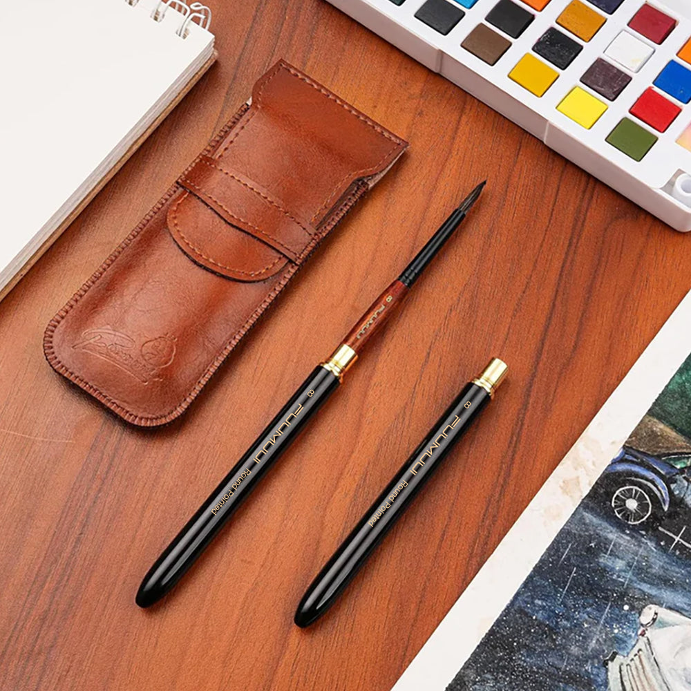 Fuumuui natural squirrel hair travel watercolor brush set with a detachable design, with its leather case and a watercolor paint palette.