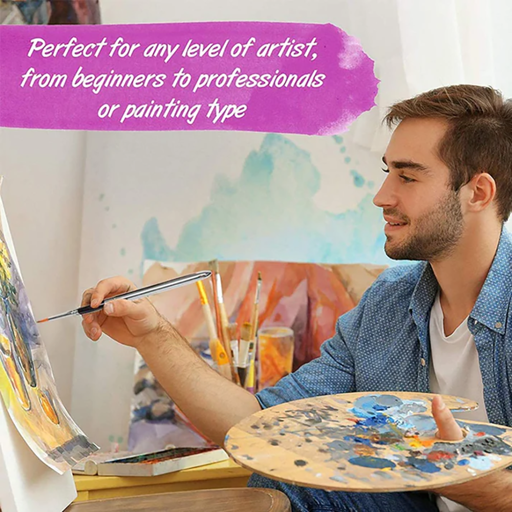 A male artist holding a palette and painting a picture on an easel with a Fuumuui travel watercolor brush.