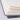 Close-up of a Watercolor Sketchbook featuring 100% Cotton, Cold Press, 140lb/300gsm paper with a durable gray linen hard cover, ideal for professional artists and watercolor painting.