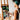 Artist painting a detailed portrait with Fuumuui professional watercolor brushes on an easel.