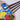 Fuumuui Natural Bristle Flat oil paint brush set in sizes 22, 18, 14, and 10. Professional artist brushes for acrylic paint and oil paint displayed on a wooden palette with thick, vibrant pigment.
