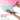 Lightweight 72g mint green travel palette held by an artist with a Fuumuui size 12 round watercolor brush. Portable plastic travel palette for professional artists and beginners.
