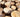 Sustainably sourced FSC-certified wooden logs used for crafting high-quality handles for watercolor brushes, oil paint brushes, and acrylic paint brushes for professional artists and beginners.