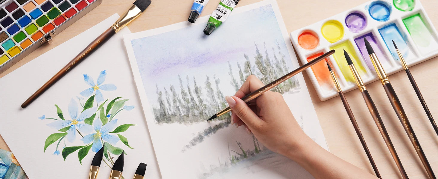 Artist using a Fuumuui soft synthetic squirrel hair watercolor brush on cold press paper. Includes FSC round and flat brushes, a plastic palette, and watercolor paint set for professional artists and beginners.