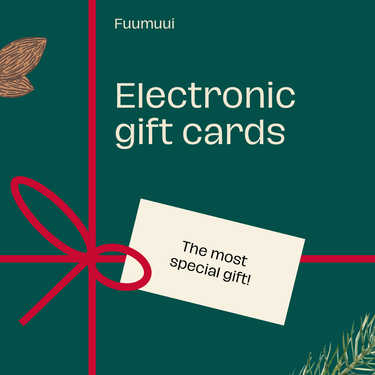 Fuumuui electronic gift card wrapped in red ribbon and bow on a dark green background, with a tag reading "The most special gift!". Ideal for Fuumuui art supplies.