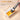 Flat brush dipping into 3ml semi-solid candy color opaque watercolor paint pan to activate.