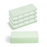 Mint green Fuumuui 3-tier empty paint palette box shown open with pan compartments alongside a closed box.