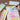 Hand painting macarons on paper next to a mint green Fuumuui 3-tier paint palette filled with colorful paints.