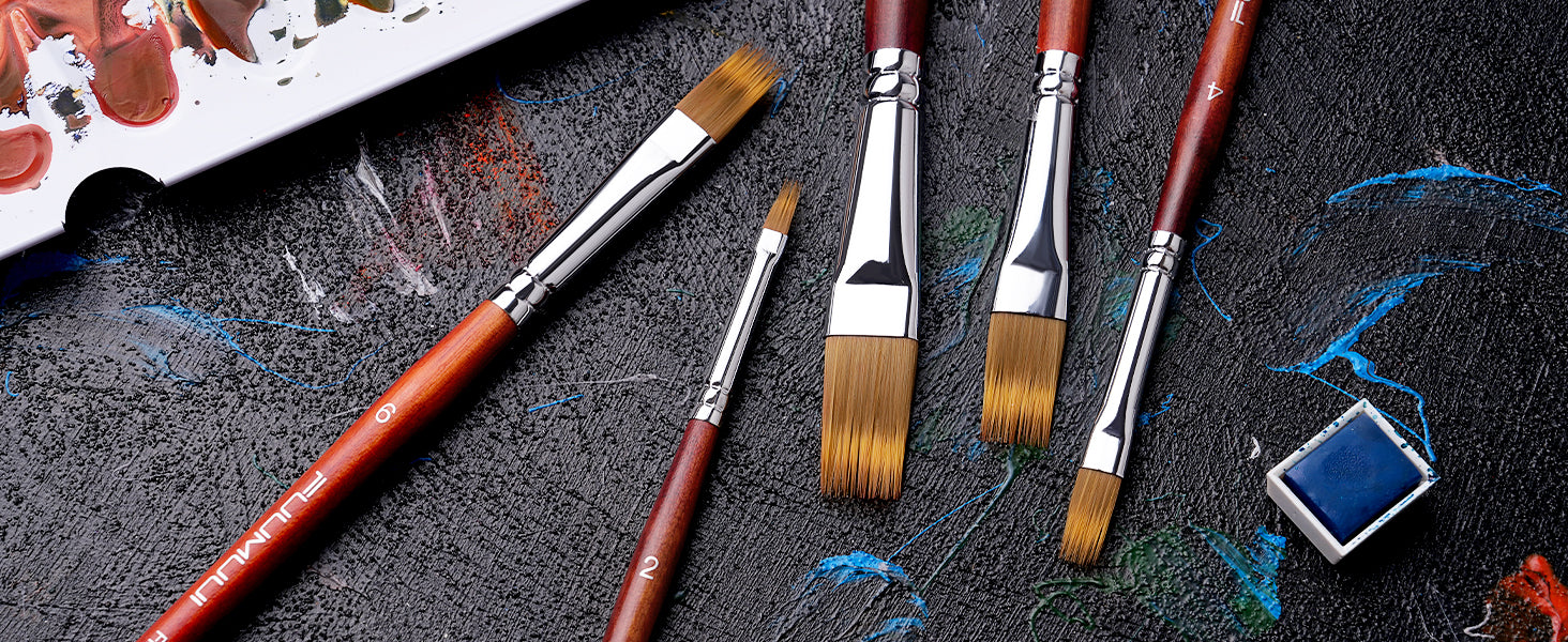 Fuumuui Art synthetic nylon watercolor brushes in sizes 2, 4, and 6 for professional artists. Flat and round acrylic paint brushes shown with a plastic palette and blue pigment pan on a dark textured background.