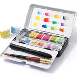 Fuumuui Travel Watercolor Set open, displaying 12 vibrant watercolor half pans, a travel watercolor brush, built-in mixing palette, and color swatch card, all within a compact Fuumuui art supplies metal tin.