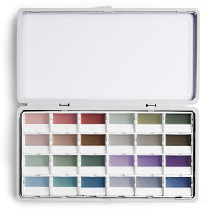 Fuumuui Art Supplies 24-Color Opaque Semi-Solid Watercolor Paint Set, open and displaying the full palette of muted colors.