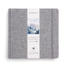 Fuumuui Art Supplies 7.6x7.6" cold-press 100% cotton watercolor art journal with a grey fabric cover and elastic band.