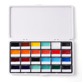 Set di colori opachi semisolidi a 24 colori Fuumuui aperto, che mostra 24 vivaci colori in godet individuali in una custodia bianca per forniture artistiche.