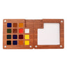 Fuumuui Premium Wood Watercolor Set open, displaying 15 handpicked color pans and the built-in white mixing palette for art supplies.