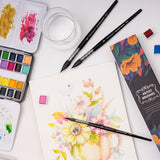 Set di 3 pennelli per acquerello Fuumuui con pelo di scoiattolo sintetico di alta qualit¨¤ che crea un vivace dipinto floreale, mostrando un flusso di colore uniforme e un controllo preciso insieme ai materiali artistici Fuumuui.