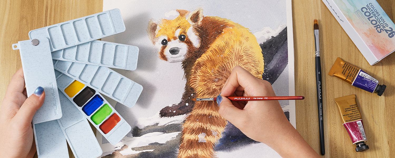 Artist using a Fuumuui Flat Grainer brush and travel palette to paint a red panda. Includes a 26 colors solid watercolor set, watercolor paint tubes, and size 4 filbert grainer brush on textured cold press paper.