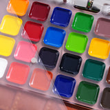 Fuumuui Watercolor Travel Set: close-up of vibrant premium watercolor paint pans under a clear protective cover.